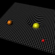 Spacetime curvature. Crediti: ESA–C.Carreau https://www.esa.int/ESA_Multimedia/Images/2015/09/Spacetime_curvature